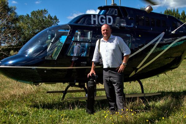 Bayleys Northland rural real estate agent John Barnett with a new tool for his trade.